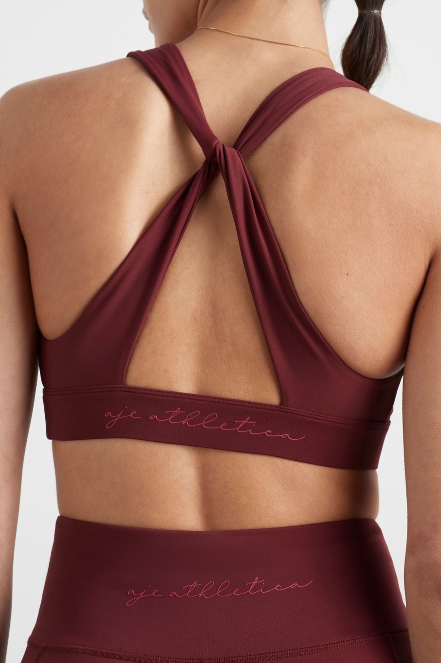 Tops Aje ATHLETICA | Twist Back Sports Bra 335 Burnt Burgundy/Berry